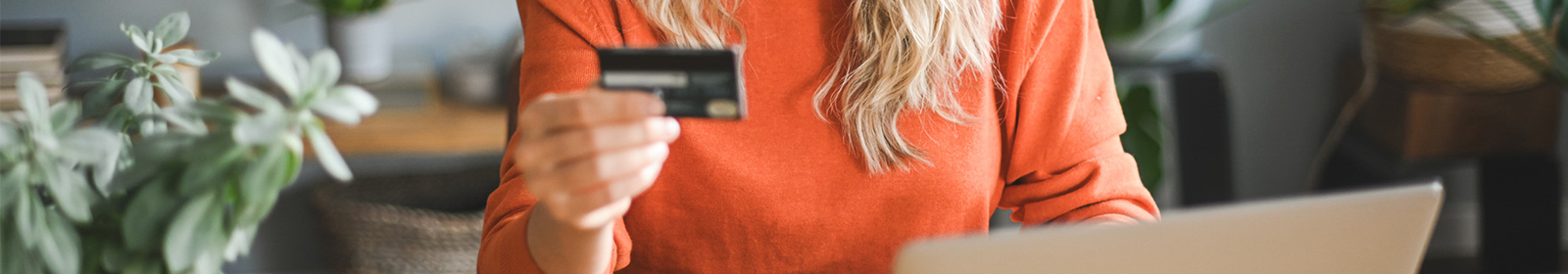 Closeup of person holding a credit card