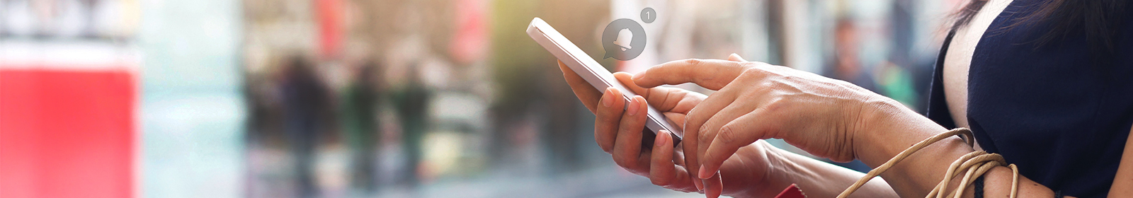 Close up of hands holding phone